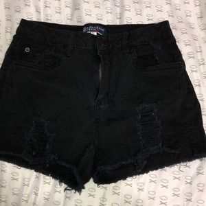 Cheeky mid rise black shorts
